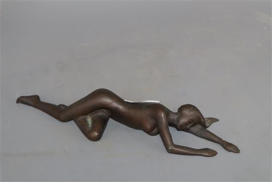 A bronze of a sleeping recumbent nude lady, length 28cm